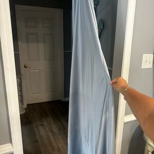 Worn once for a wedding. Had dry cleaned after.